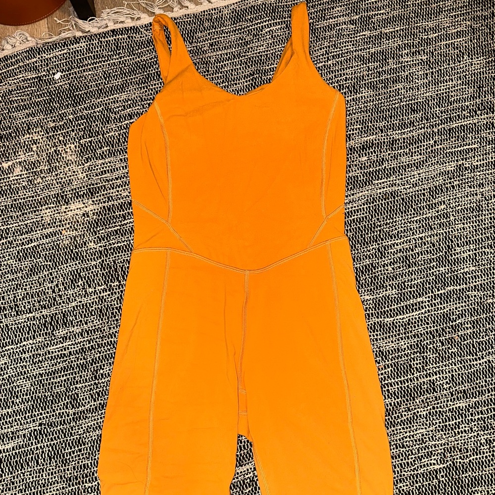 Orange Lululemon romper, size 4, perfect conditions